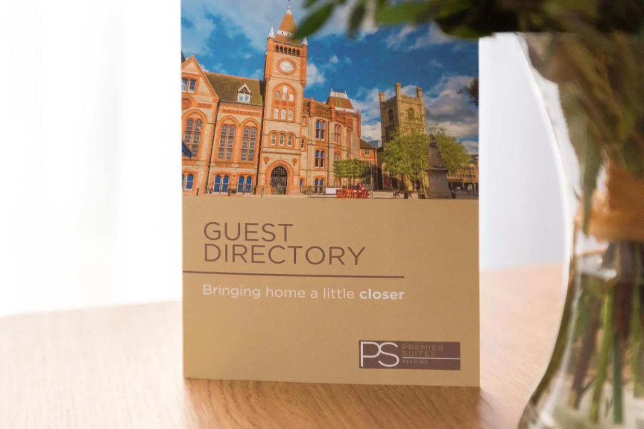 Guest directory and welcome details on an apartment table